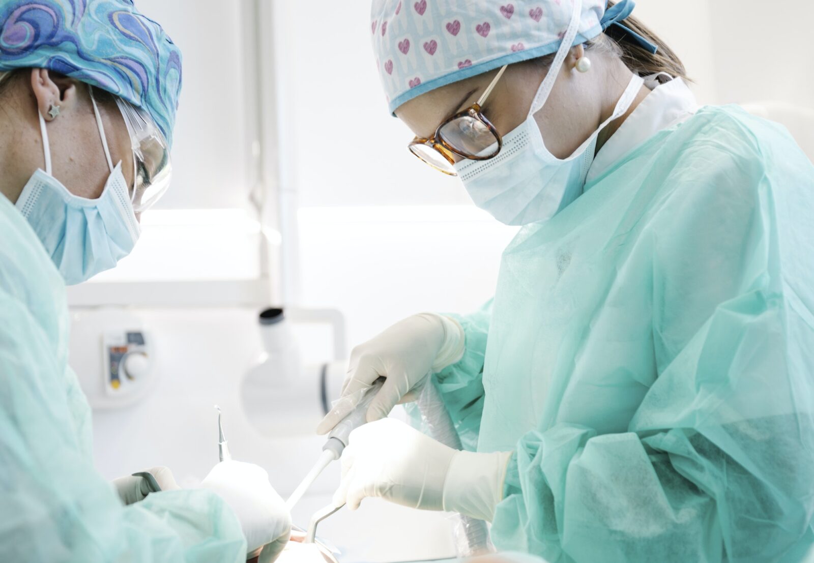 Dentists making surgery in clinic